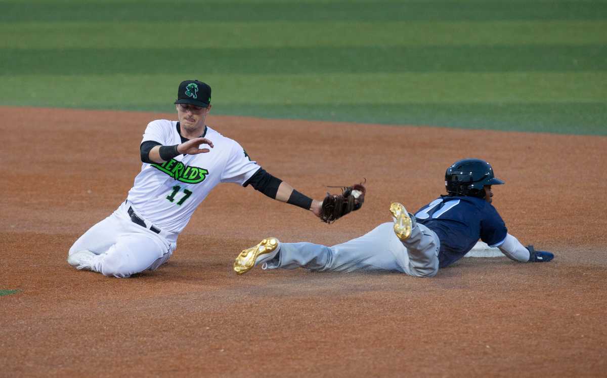SF Giants prospect Tyler Fitzgerald attempts to tag D.J. Burt. (2021)